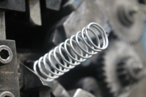 Compression Spring being wound and finished